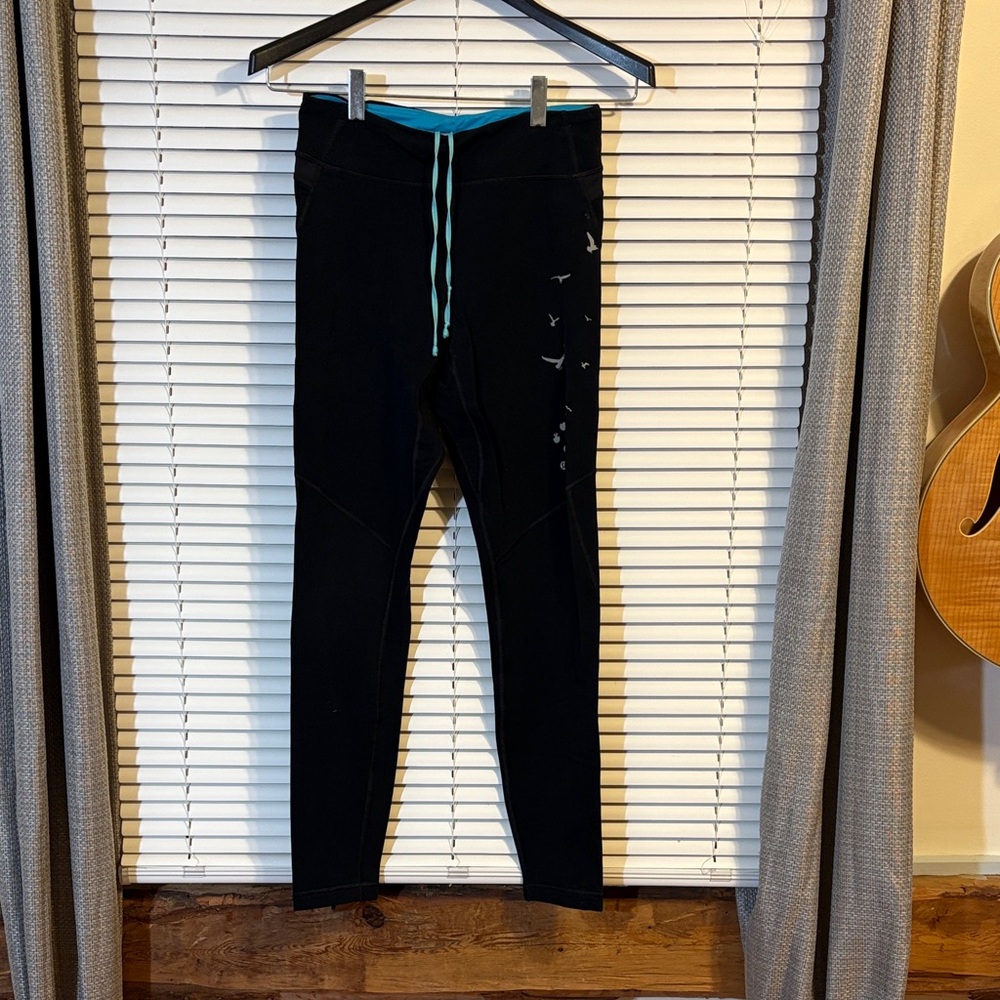 Lululemon Athletica Black Leggings with Teal Drawstring and Bird Design
